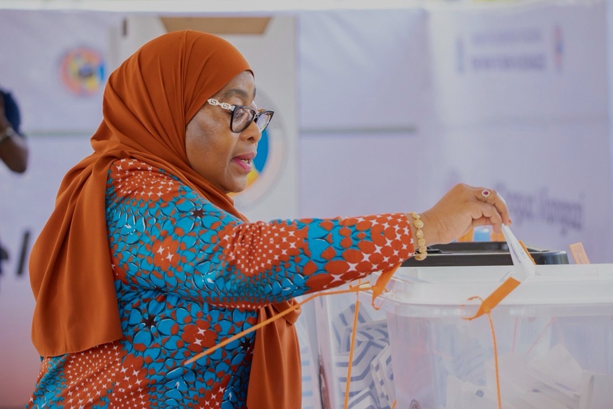 Tanzanian President Samia Suluhu Hassan casts her vote at a polling station in Dodoma, Tanzania, on Wednesday.